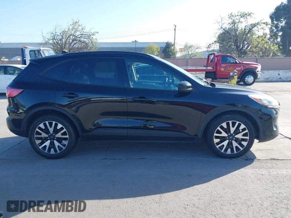 2020 Ford Escape SE Sport Hybrid with VIN 1FMCU0BZ3LUC35370, listed as a IAAI auction lot 41949985 with 256,781 mi miles and . Bid and sale history available at DreamBid. Image 13.