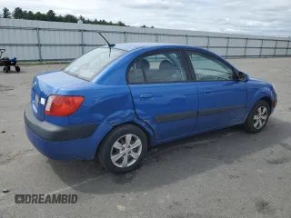2009 Kia Rio LX with VIN KNADE223696530633, listed as a Copart auction lot 68371794 with 165,505 mi miles and Salvage Title. Bid and sale history available at carsss.com. Image 3.