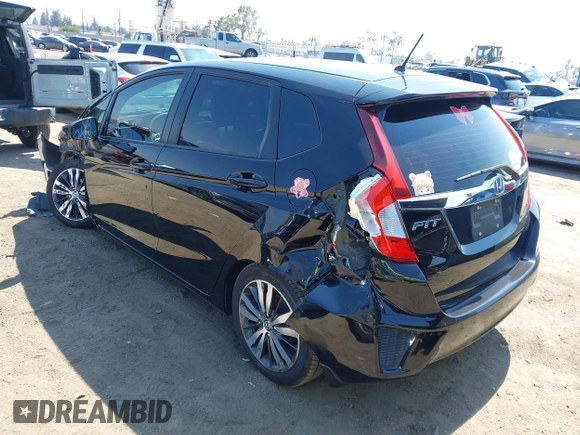 2015 Honda Fit EX-L z VIN 3HGGK5H85FM717646, wystawiony jako IAAI lot #42483387 z przebiegiem 137 296 mil mil oraz . Historia ofert i sprzedaży dostępna na DreamBid. Obrazek 3.