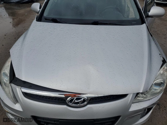2011 Hyundai Elantra Touring SE with VIN KMHDC8AE4BU117993, listed as a Copart auction lot 79183934 with 108,031 mi miles and Salvage Title. Bid and sale history available at carsss.com. Image 11.