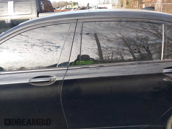2019 BMW 7 Series 750i xDrive with VIN WBA7F2C52KB240302, listed as a IAAI auction lot 40984933 with 93,737 mi miles and . Bid and sale history available at DreamBid. Image 14.