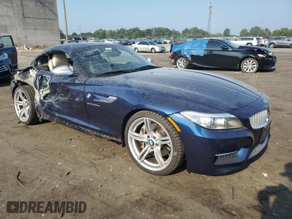 2014 BMW Z4 sDrive35is with VIN WBALM1C57EE634167, listed as a Copart auction lot 69088044 with 68,620 mi miles and Salvage title. Bid and sale history available at DreamBid. Image 4.