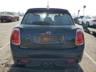 2021 MINI Hardtop 4 Door Cooper S с VIN WMWXU9C06M2N01629, выставлен на аукционе Copart как лот 65398605 с пробегом 74 356 миль миль и Списание • Salvage title. История ставок и продаж доступна на DreamBid. Изображение 6.