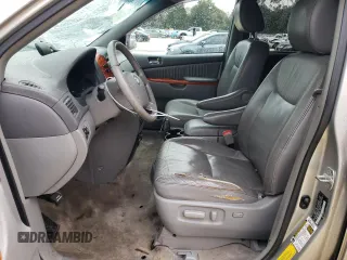 2009 Toyota Sienna XLE with VIN 5TDBK22C89S027706, listed as a Copart auction lot 88672015 with 215,515 mi miles and Salvage Title. Bid and sale history available at DreamBid. Image 7.