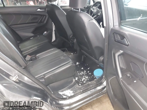 2023 Volkswagen Tiguan SE with VIN 3VVMB7AX5PM013447, listed as a IAAI auction lot 41615200 with 66,259 mi miles and . Bid and sale history available at DreamBid. Image 8.