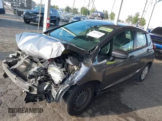 2015 Honda Fit LX with VIN 3HGGK5H58FM713533, listed as a IAAI auction lot 40473868 with Not provided miles and . Bid and sale history available at DreamBid. Image 2.