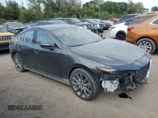 2019 Mazda 3 Premium with VIN JM1BPBEMXK1119599, listed as a Copart auction lot 71036504 with 61,371 mi miles and Salvage Title. Bid and sale history available at DreamBid. Image 4.