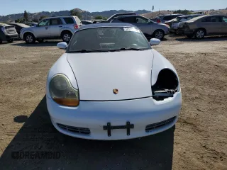1999 Porsche Boxster с VIN WP0CA2981XU626335, выставлен на аукционе Copart как лот 58570495 с пробегом 140 751 миль миль и Списание • Salvage title. История ставок и продаж доступна на DreamBid. Изображение 5.