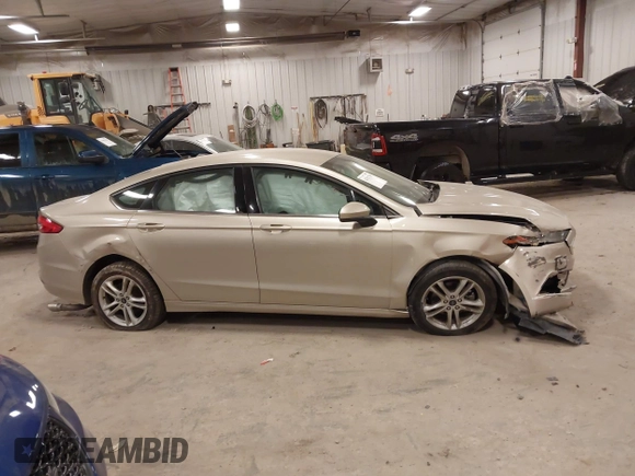 2018 Ford Fusion SE z VIN 3FA6P0HD2JR201693, wystawiony jako IAAI lot #42012709 z przebiegiem 110 857 mil mil oraz . Historia ofert i sprzedaży dostępna na DreamBid. Obrazek 13.