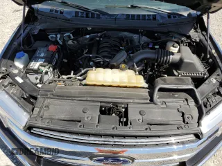 2019 Ford F-150 XL with VIN 1FTEW1E54KFB61479, listed as a Copart auction lot 53517095 with 104,201 mi miles and Salvage title. Bid and sale history available at DreamBid. Image 11.