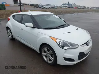 2013 Hyundai Veloster w/Gray Int with VIN KMHTC6AD8DU171050, listed as a IAAI auction lot 41992468 with 186,714 mi miles and . Bid and sale history available at DreamBid. Image 1.