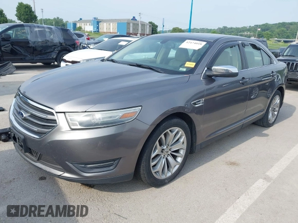 2013 Ford Taurus Limited z VIN 1FAHP2F8XDG185782, wystawiony jako IAAI lot #42474018 z przebiegiem 181 144 mil mil oraz . Historia ofert i sprzedaży dostępna na DreamBid. Obrazek 2.