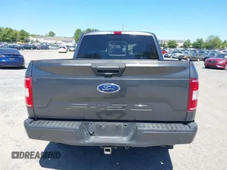 2018 Ford F-150 XL with VIN 1FTEW1EG2JFE55513, listed as a IAAI auction lot 41530354 with 132,617 mi miles. Bid and sale history available at carsss.com. Image 16.