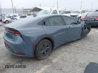 2024 Toyota Prius LE with VIN JTDACAAU9R3039099, listed as a IAAI auction lot 41384941 with 2,601 mi miles. Bid and sale history available at carsss.com. Image 4.