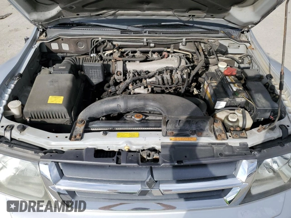 2002 Mitsubishi Montero XLS z VIN JA4MW31R02J005334, wystawiony jako Copart lot #79394064 z przebiegiem 285 949 mil mil oraz Czysty tytuł • Clean title. Historia ofert i sprzedaży dostępna na DreamBid. Obrazek 12.