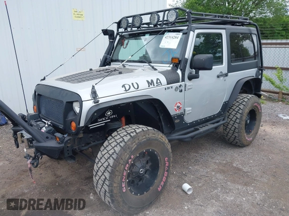 2007 Jeep Wrangler X with VIN 1J4FA24117L142513, listed as a IAAI auction lot 42314284 with 70,213 mi miles and . Bid and sale history available at DreamBid. Image 2.