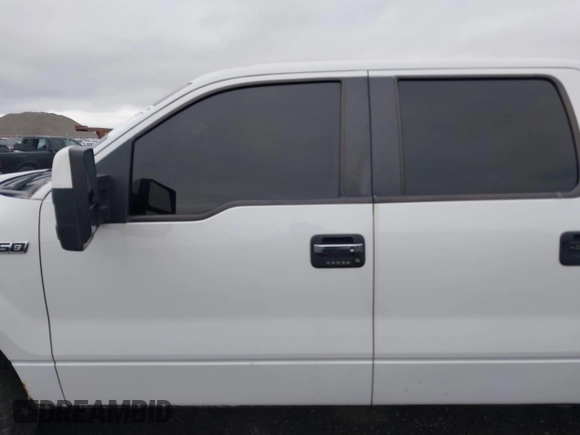 2011 Ford F-150 XL with VIN 1FTFW1EF9BFA00476, listed as a IAAI auction lot 40983977 with 189,294 mi miles. Bid and sale history available at carsss.com. Image 14.