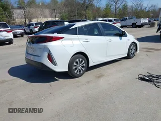 2021 Toyota Prius LE with VIN JTDKAMFP8M3174629, listed as a IAAI auction lot 42087974 with 16,348 mi miles and . Bid and sale history available at DreamBid. Image 4.