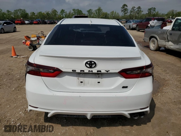 2023 Toyota Camry SE with VIN 4T1G11AKXPU767953, listed as a Copart auction lot 50728415 with 63,249 mi miles and Salvage Title. Bid and sale history available at DreamBid. Image 6.