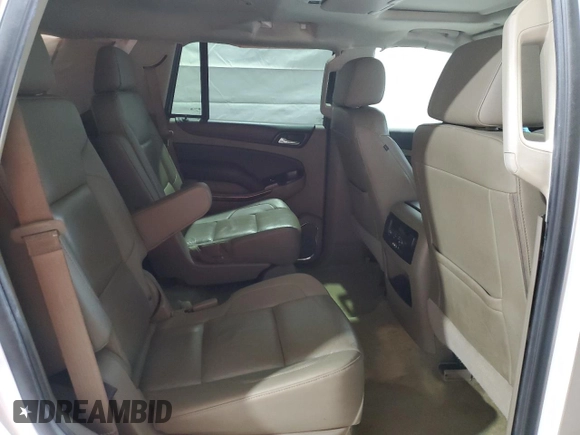 2016 Chevrolet Tahoe LT z VIN 1GNSKBKC1GR297931, wystawiony jako Copart lot #58213565 z przebiegiem 165 140 mil mil oraz Szkoda całkowita • Salvage title. Historia ofert i sprzedaży dostępna na DreamBid. Obrazek 11.