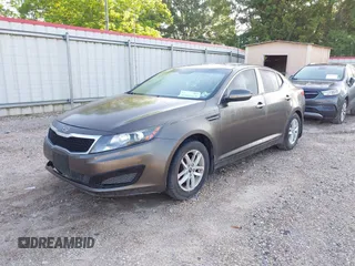 2011 Kia Optima LX with VIN KNAGM4A74B5085319, listed as a IAAI auction lot 42061665 with 224,517 mi miles and . Bid and sale history available at carsss.com. Image 2.