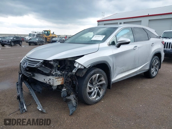 2018 Lexus RX 450hL Premium with VIN JTJDGKCA6J2003954, listed as a IAAI auction lot 42259774 with 93,706 mi miles and . Bid and sale history available at DreamBid. Image 17.