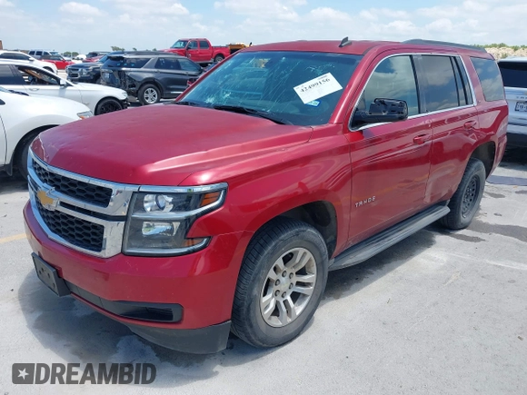 2015 Chevrolet Tahoe LS with VIN 1GNSCAEC4FR121571, listed as a IAAI auction lot 42499156 with 131,284 mi miles and . Bid and sale history available at DreamBid. Image 18.
