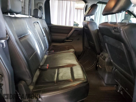 2011 Nissan Titan Pro-4X with VIN 1N6AA0EC5BN307980, listed as a Copart auction lot 42000295 with 168,335 mi miles and Salvage title. Bid and sale history available at DreamBid. Image 10.