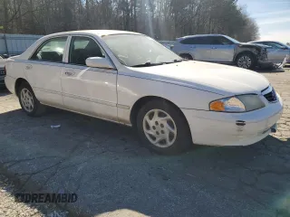 2001 Mazda 626 LX with VIN 1YVGF22C815240640, listed as a Copart auction lot 47609315 with 0 mi miles and Salvage Title. Bid and sale history available at carsss.com. Image 4.