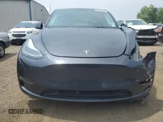 2024 Tesla Model Y Long Range z VIN 7SAYGDEE2RF986871, wystawiony jako Copart lot #60168535 z przebiegiem 15 647 mil mil oraz Szkoda całkowita • Salvage title. Historia ofert i sprzedaży dostępna na DreamBid. Obrazek 5.