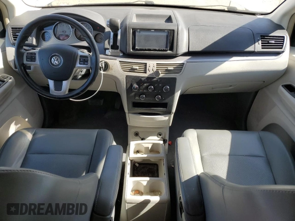 2011 Volkswagen Routan SE with VIN 2V4RW3DG5BR739944, listed as a Copart auction lot 56787495 with 84,932 mi miles and Salvage title. Bid and sale history available at DreamBid. Image 8.