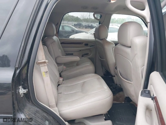 2005 Cadillac Escalade with VIN 1GYEC63TX5R203156, listed as a IAAI auction lot 41937137 with 239,919 mi miles. Bid and sale history available at carsss.com. Image 8.