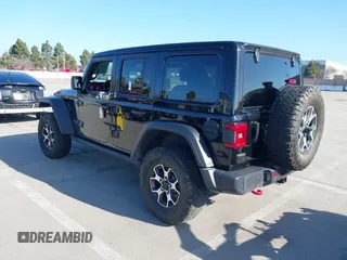 2021 Jeep Wrangler Unlimited Rubicon with VIN 1C4JJXFM5MW722572, listed as a IAAI auction lot 41667167 with Not provided miles and . Bid and sale history available at DreamBid. Image 3.