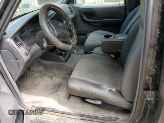 2001 Ford Ranger XLT Appearance with VIN 1FTYR14E81TB05454, listed as a Copart auction lot 56795484 with 144,927 mi miles and Salvage Title. Bid and sale history available at carsss.com. Image 7.