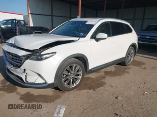 2016 Mazda CX-9 Grand Touring z VIN JM3TCADY6G0125547, wystawiony jako IAAI lot #41997445 z przebiegiem 129 179 mil mil oraz . Historia ofert i sprzedaży dostępna na DreamBid. Obrazek 17.