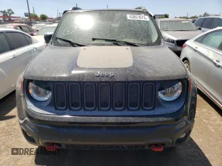 2015 Jeep Renegade Trailhawk z VIN ZACCJBCT9FPB21561, wystawiony jako Copart lot #63051673 z przebiegiem Nie podano mil oraz Szkoda całkowita • Salvage title. Historia ofert i sprzedaży dostępna na DreamBid. Obrazek 5.