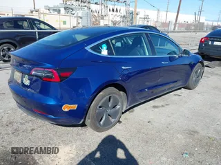 2019 Tesla Model 3 Mid Range with VIN 5YJ3E1EA8KF436086, listed as a IAAI auction lot 41682093 with 70,332 mi miles and . Bid and sale history available at DreamBid. Image 4.
