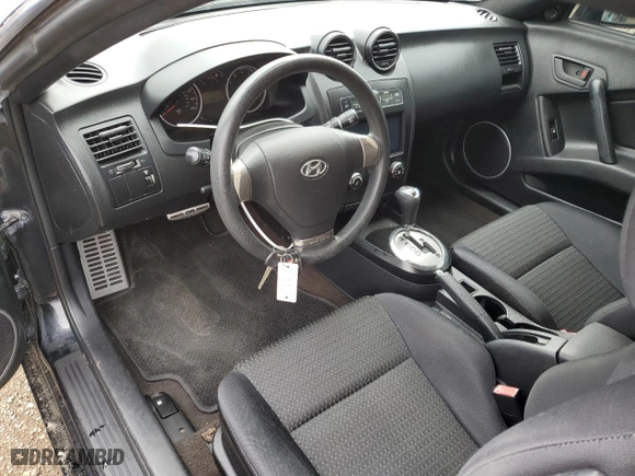 2008 Hyundai Tiburon GS with VIN KMHHM66D38U295048, listed as a Copart auction lot 69190834 with 88,219 mi miles and Salvage Title. Bid and sale history available at carsss.com. Image 8.
