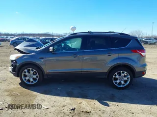 2013 Ford Escape SEL with VIN 1FMCU0HX2DUA51416, listed as a IAAI auction lot 41689474 with 140,596 mi miles and . Bid and sale history available at DreamBid. Image 15.