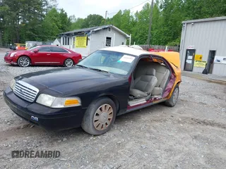 2009 Ford Police Interceptor z VIN 2FAHP71VX9X143897, wystawiony jako IAAI lot #41443264 z przebiegiem Nie podano mil oraz . Historia ofert i sprzedaży dostępna na DreamBid. Obrazek 2.