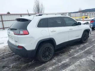 2019 Jeep Cherokee Altitude with VIN 1C4PJLLX9KD416808, listed as a IAAI auction lot 41625084 with 67,544 mi miles. Bid and sale history available at carsss.com. Image 4.