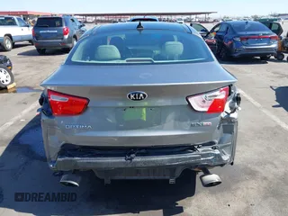 2014 Kia Optima EX z VIN 5XXGN4A72EG339786, wystawiony jako IAAI lot #42328516 z przebiegiem 103 035 mil mil oraz . Historia ofert i sprzedaży dostępna na DreamBid. Obrazek 6.