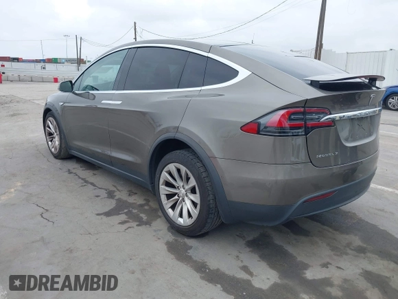 2016 Tesla Model X 70D with VIN 5YJXCBE22GF017499, listed as a IAAI auction lot 42192962 with 103,430 mi miles and . Bid and sale history available at DreamBid. Image 3.