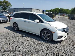 2019 Honda Odyssey Touring with VIN 5FNRL6H81KB051846, listed as a Copart auction lot 58723015 with 68,142 mi miles and Salvage title. Bid and sale history available at DreamBid. Image 4.