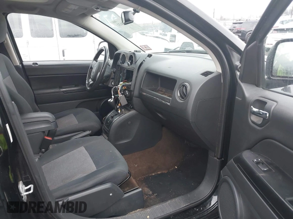 2013 Jeep Compass Latitude with VIN 1C4NJDEB3DD221904, listed as a IAAI auction lot 41691631 with 134,683 mi miles. Bid and sale history available at carsss.com. Image 5.