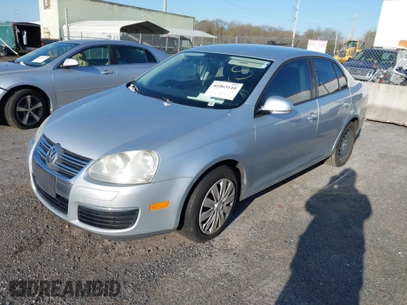 2009 Volkswagen Jetta S z VIN 3VWJM71K09M041494, wystawiony jako IAAI lot #41863110 z przebiegiem Nie podano mil oraz . Historia ofert i sprzedaży dostępna na DreamBid. Obrazek 2.