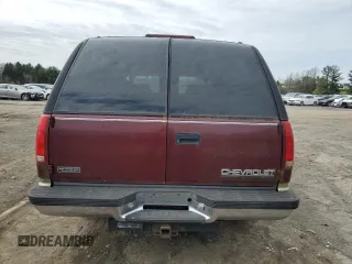 1999 Chevrolet Suburban z VIN 1GNFK16R2XJ328550, wystawiony jako Copart lot #53179525 z przebiegiem 170 914 mil mil oraz Czysty tytuł • Clean title. Historia ofert i sprzedaży dostępna na DreamBid. Obrazek 6.