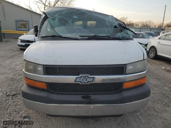 2014 Chevrolet Express Passenger LT with VIN 1GAZG1FGXE1187397, listed as a Copart auction lot 43209785 with 168,614 mi miles and Salvage Title. Bid and sale history available at carsss.com. Image 5.