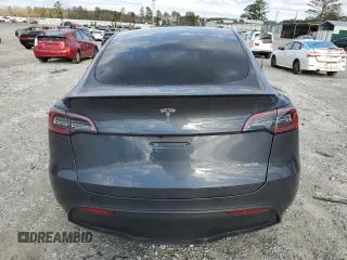 2023 Tesla Model Y Performance with VIN 7SAYGDEF4PF920859, listed as a Copart auction lot 89136705 with 8,148 mi miles and Salvage Title. Bid and sale history available at DreamBid. Image 6.