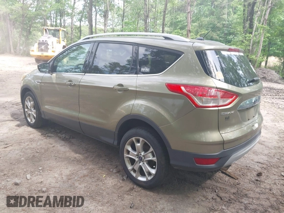 2014 Ford Escape Titanium with VIN 1FMCU9JX9EUB23972, listed as a IAAI auction lot 42217298 with 164,556 mi miles and . Bid and sale history available at DreamBid. Image 3.